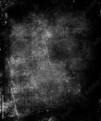 Dark Scratched Grey Grunge Abstract Texture Background. Scary halloween poster with faded central area for your text or picture