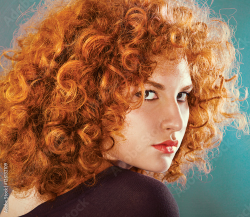 redhead sexy curly young woman