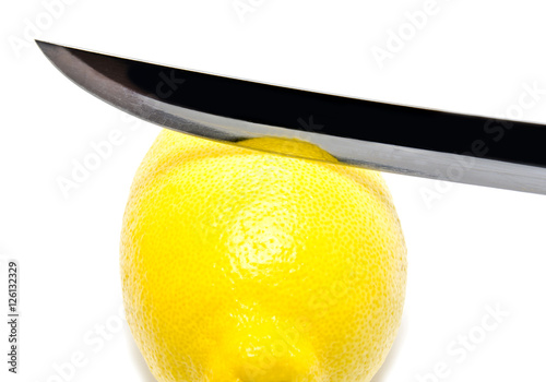 fresh lemon whith khife photo