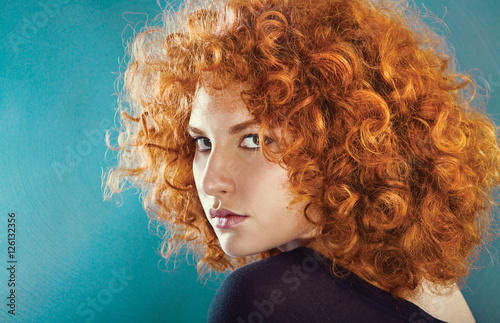 redhead sexy curly young woman
