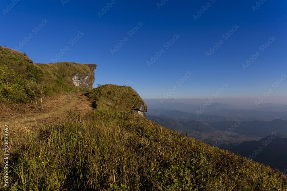 The mountain phu chee fah and blue sky at national park in chiangrai,thailand The mountain phu chee fah and blue sky at national park in chiangrai,thailand