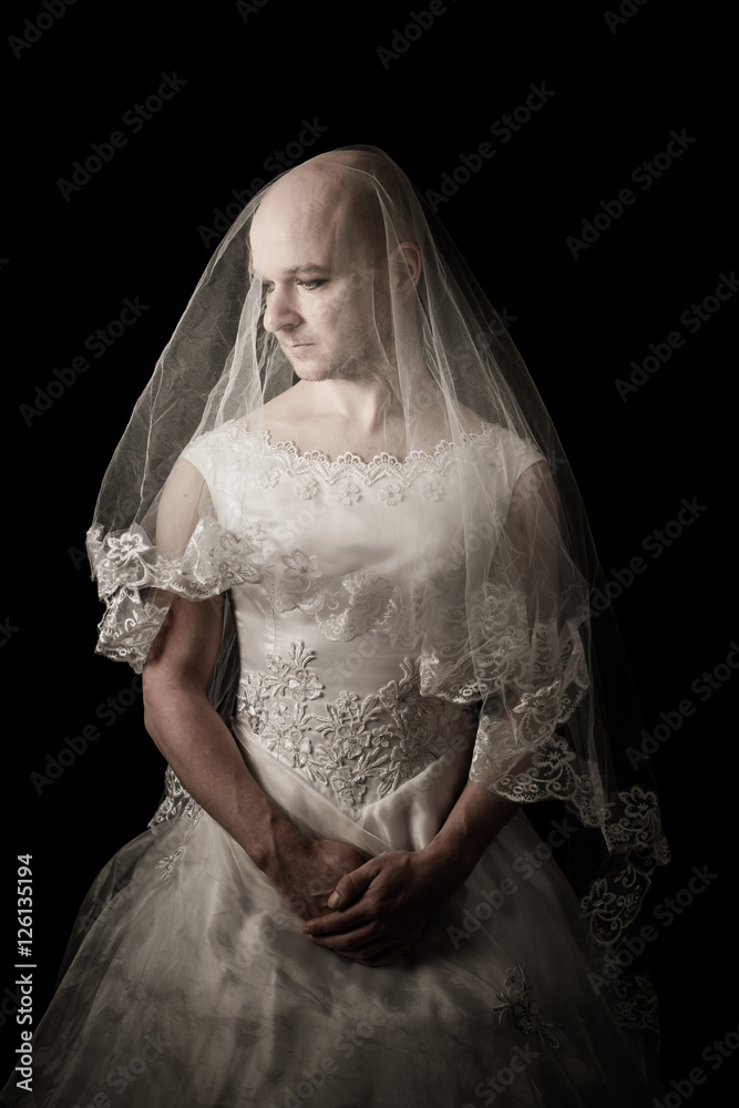 Mann im Brautkleid und Schleier StockFoto Adobe Stock