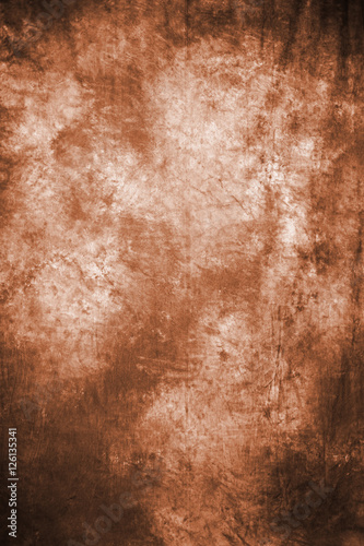 rusty mustard fabric artistic background with simulated blurred ink.