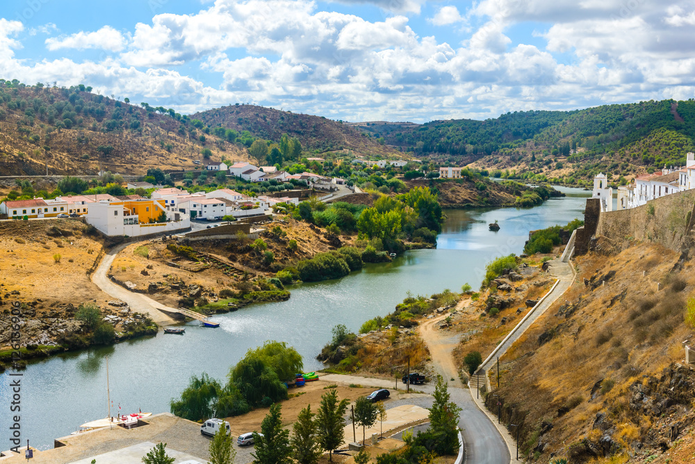 View of the river Guadiana and the village of Mertola. Alentejo Region. Portugal
