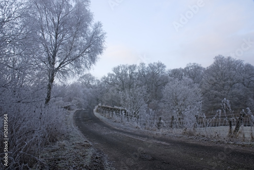 Frosty bridge on a New Years Day near the river Dochart photo