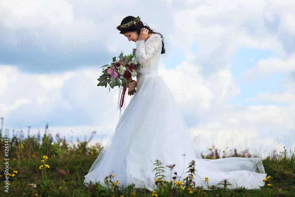 Young beautiful woman in a white dress. The concept of marriage Young beautiful woman in a white dress. The concept of marriage