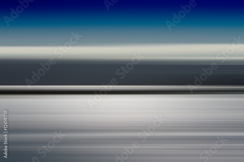 Horizontal motion blur blue ocean landscape background