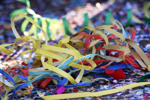 Streamers and confetti lying on the ground during Carnival celebrations in Italy