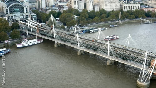 Golden Jubilee bridge in London and Thames river aerial view photo