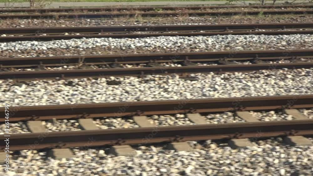 Train rails from speeding railroad vehicle, fast motion railway journey Train rails from speeding railroad vehicle, fast motion railway journey