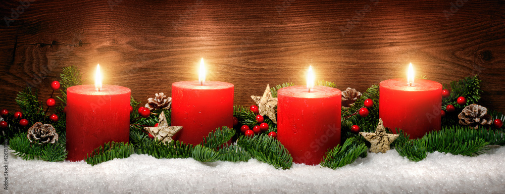 Advent Dekoration mit vier Kerzenflammen, Schnee, Tannenzweigen und Holz Hintergrund - obrazy, fototapety, plakaty 