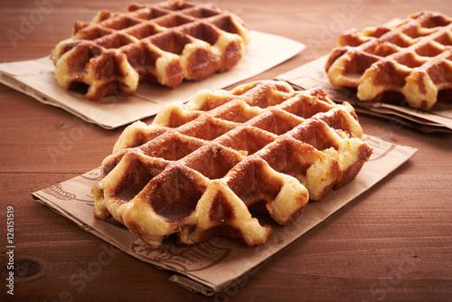 Belgian waffles on a wooden table