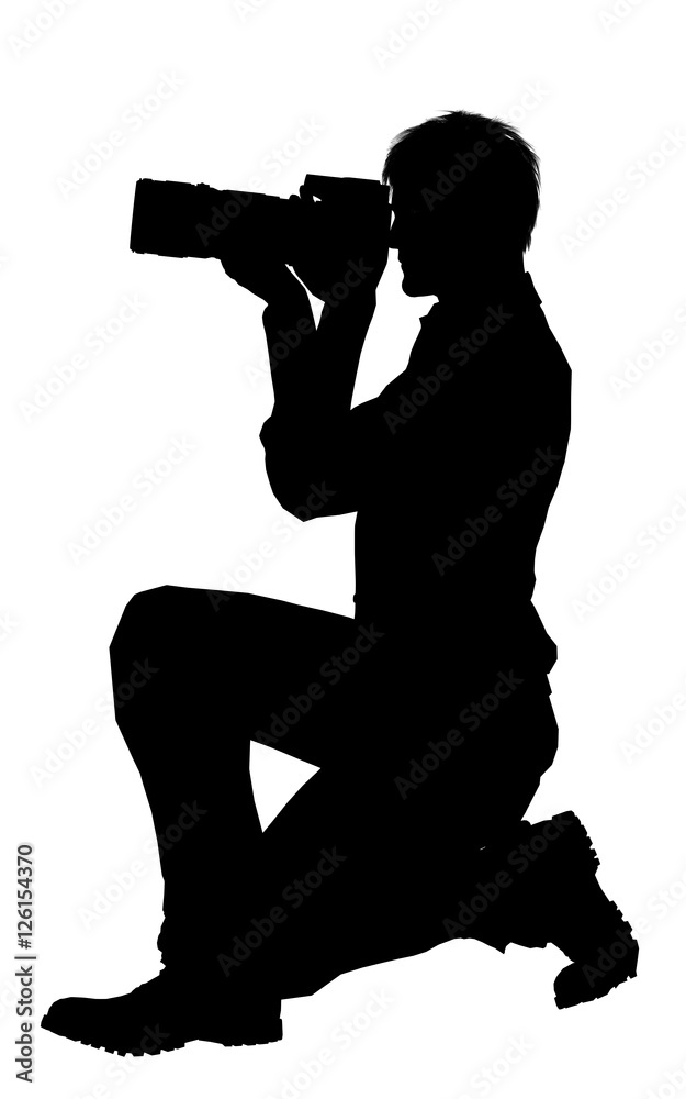 Silhouette of a photographer with dslr camera isolated on white