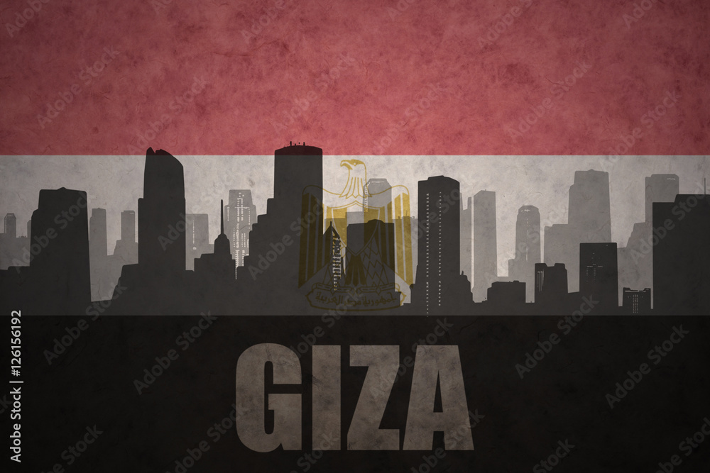 abstract silhouette of the city with text Giza at the vintage egyptian flag