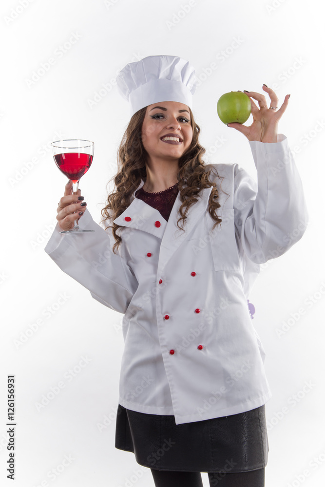 Girl chef with a large glass of wine on a white background Girl chef with a large glass of wine on a white background