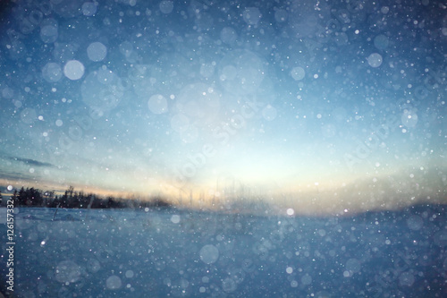 blurred winter background with snowflakes for text © kichigin19