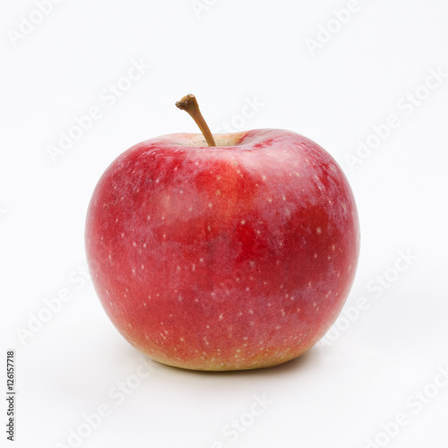 Red apple fruit on white background. macro view photo
