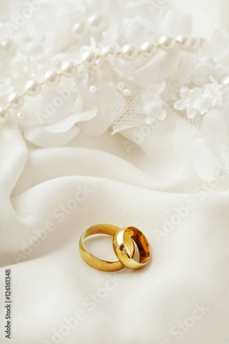 wedding rings and flowers