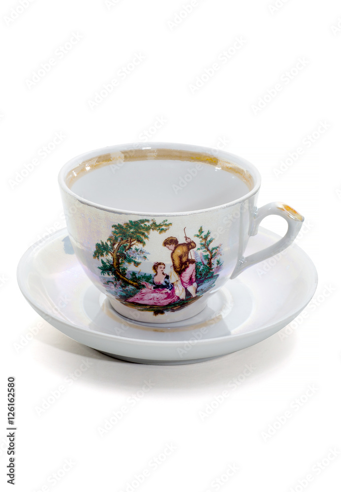 Empty elegant coffee cup on a saucer isolated on white background. Empty elegant coffee cup on a saucer isolated on white background.