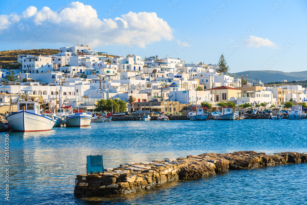 Traditional fishing port in Naoussa town at sunset time, Paros island, Greece