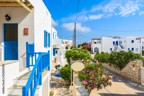View of street with typical Greek houses in Naoussa town, Paros island, Greece