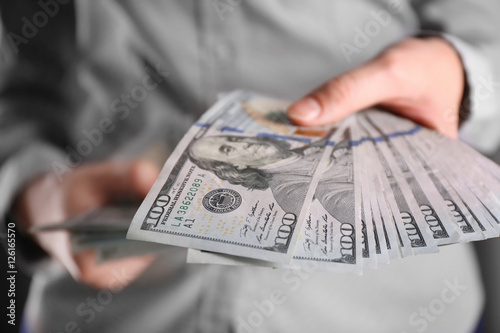 Woman holding money in hands