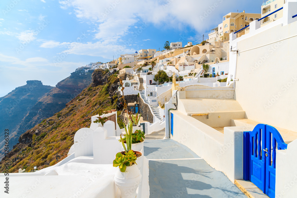 Fototapeta premium Footpath in Firostefani village with typical Greek white architecture, Santorini island, Greece