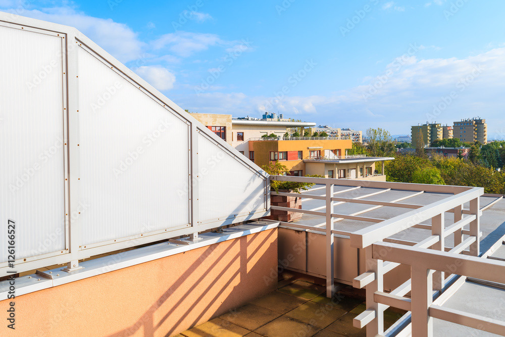 Terrace of a new colorful city apartment on sunny day in Krakow, Poland