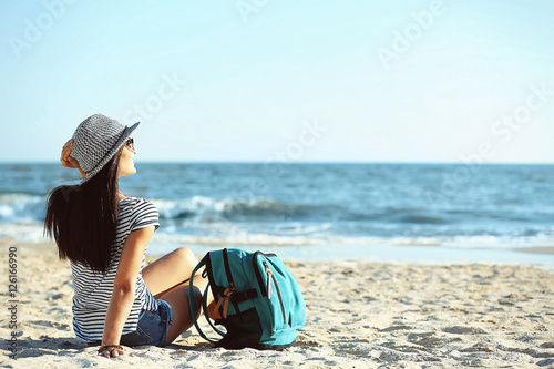 Tourist girl with backpack ...