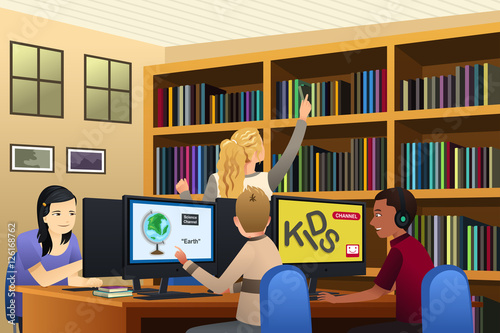 School Kids Using Computers in the Library