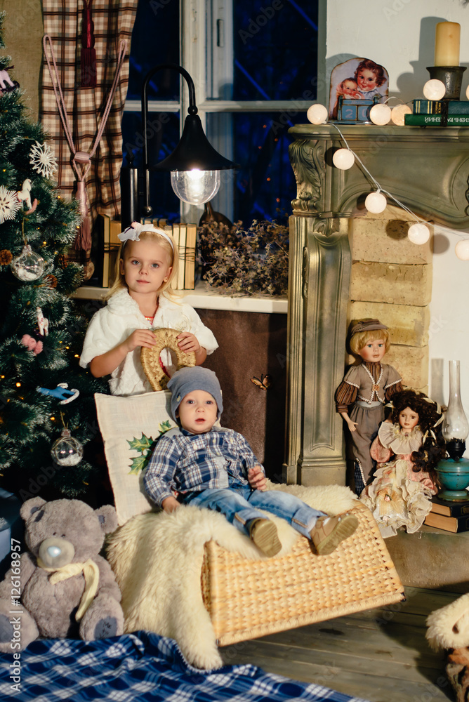 children in a studio Christmas boy and girl 1 children in a studio Christmas boy and girl 1