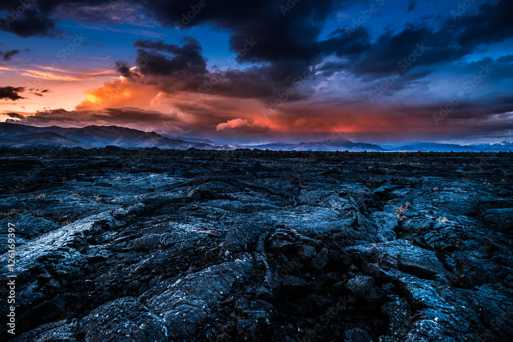 Storm Clouds over Craters of the Moon Idaho Landscape - obrazy, fototapety, plakaty 