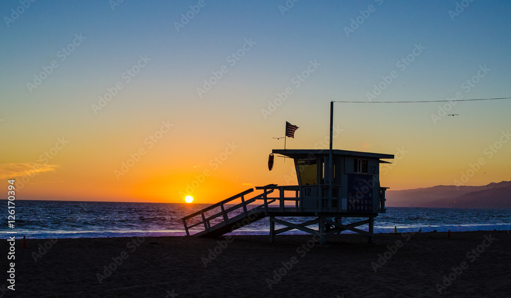 Santa Monica lifeguard station at sunset