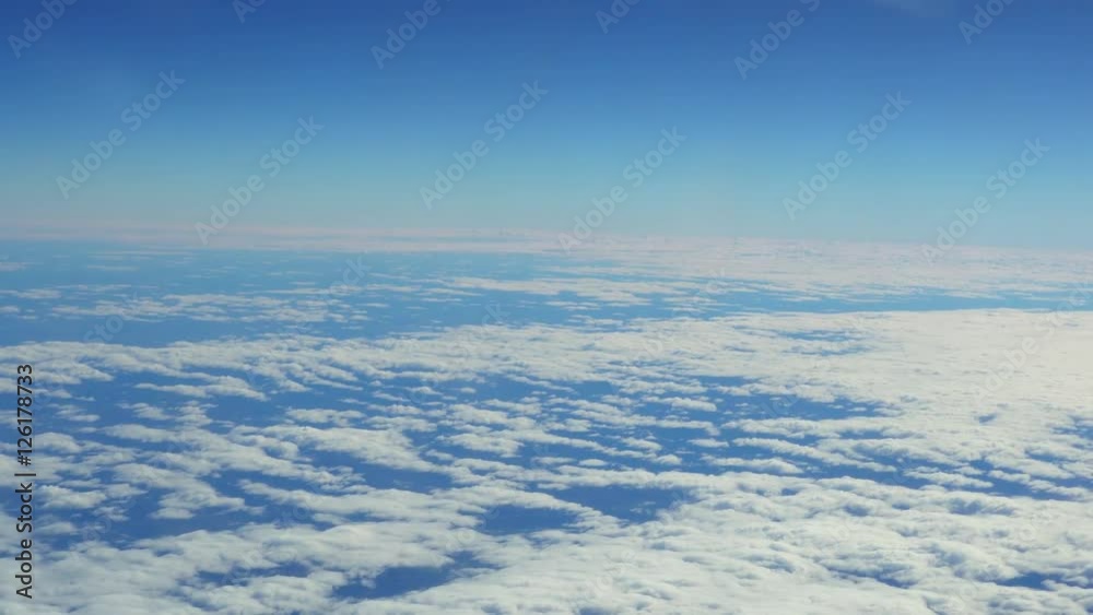 Traveling by air. View through an airplane window. Full high definition video
Traveling by air. View through an airplane window. Full high definition video