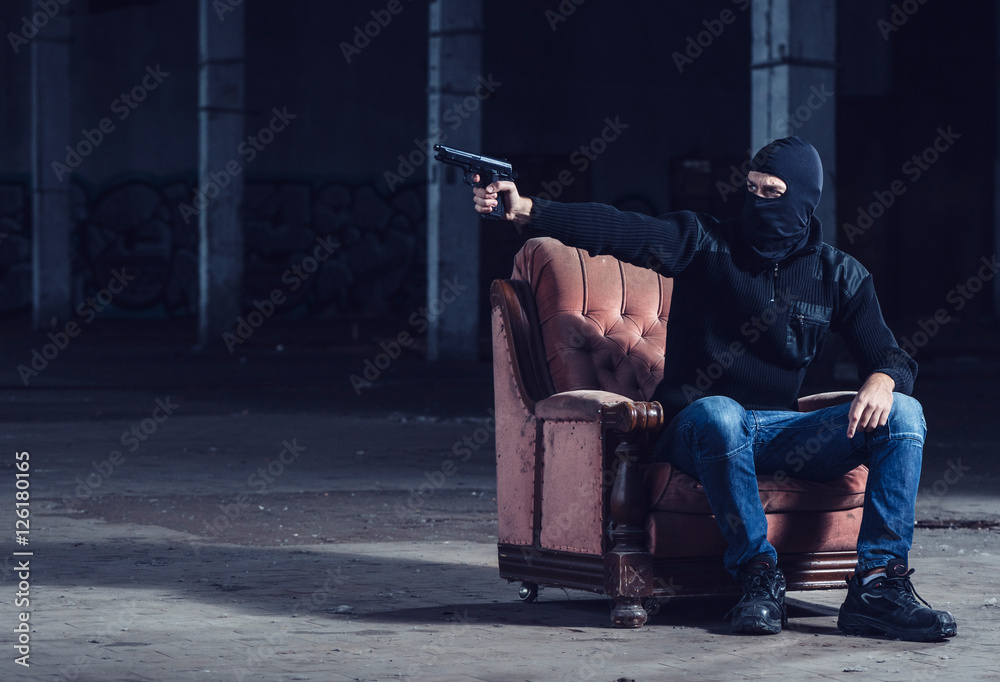 Fotografie The terrorist pointing with gun