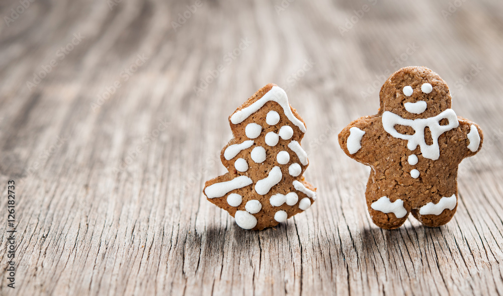 Tasty gingerbread cookie on wooden table Tasty gingerbread cookie on wooden table