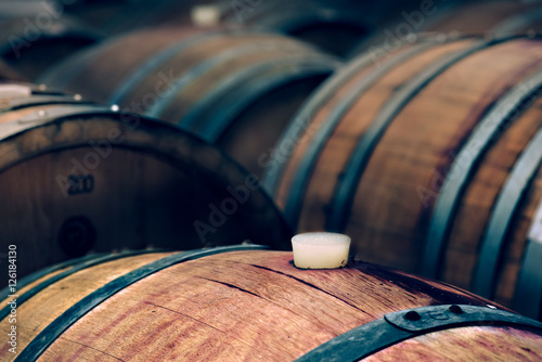Schilderij op canvas wine barrels in a cellar, detail of the bung