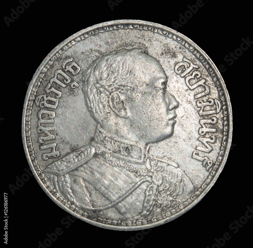 Rama IV coin Vajiravudh front isolated on black background, Thailand 