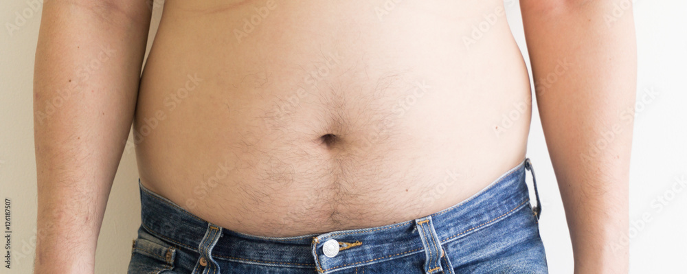 Naklejka premium Fat man with a big belly. Diet