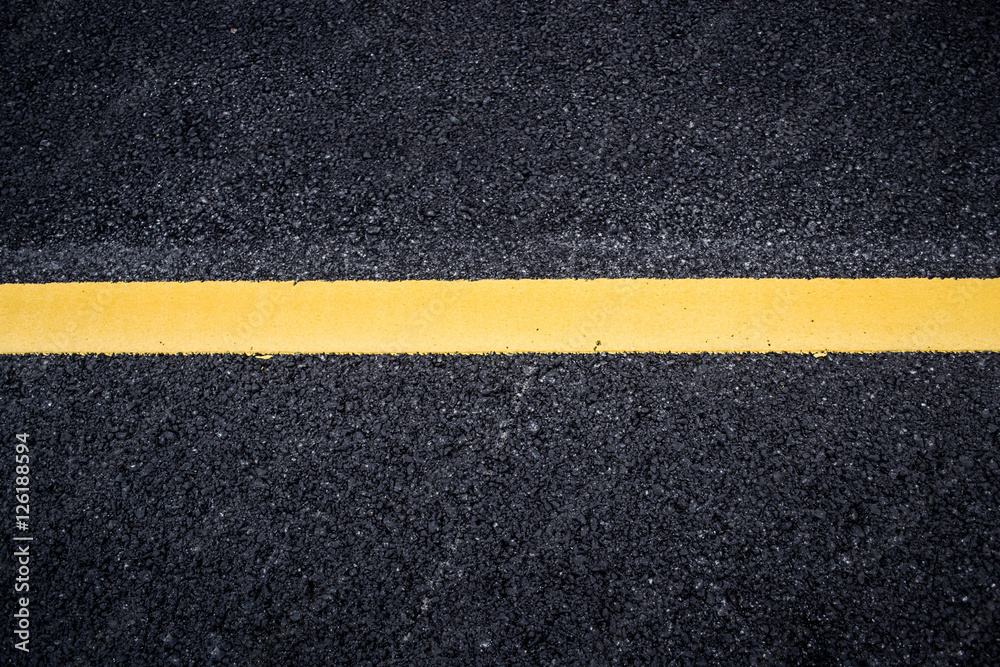 Fototapeta premium Asphalt with yellow road line