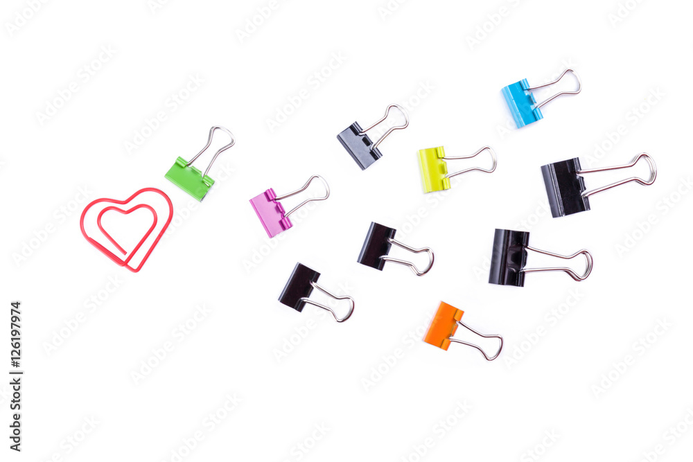 Multicolored paper clip binders and heart paper clip isolated on