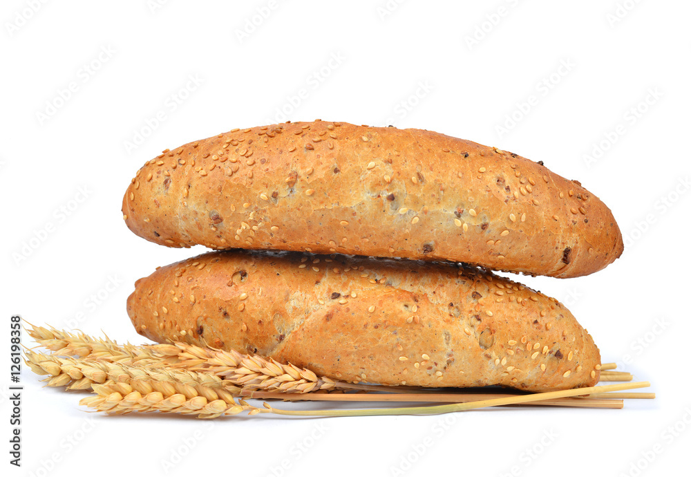 Fresh bread and wheat isolated on white background. Fresh bread and wheat isolated on white background.