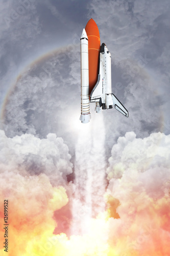 Fototapeta Naklejka Na Ścianę i Meble -  Space shuttle taking off to the sky ( NASA image not used )