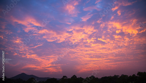 Fiery cloudy sky  expose cloudy orange sky in twilight time