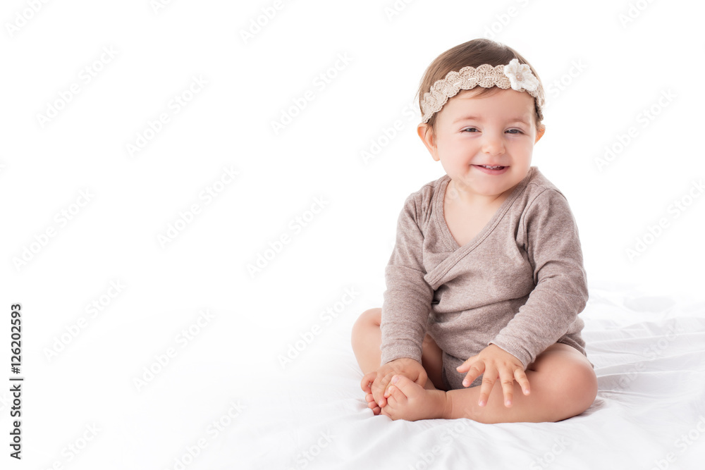 Portrait of a smilling baby girl on a white background Portrait of a smilling baby girl on a white background