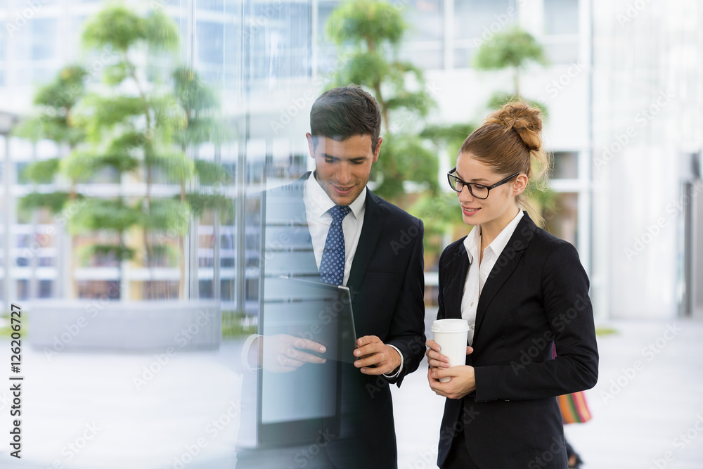 Business people having casual meeting during a coffee break Business people having casual meeting during a coffee break