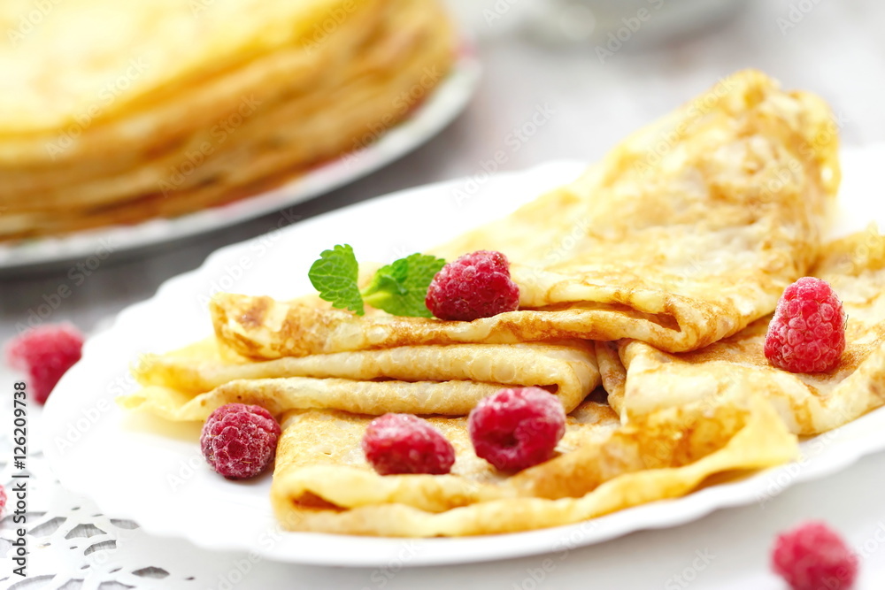 Pancakes with raspberries and butter