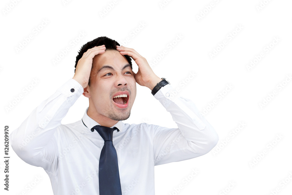 Businessman crying and holding his head in hands on while background. Businessman crying and holding his head in hands on while background.