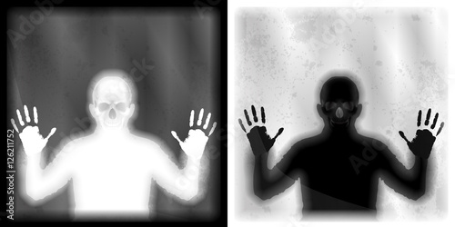 blurred shadow of the man with the skull behind the glass