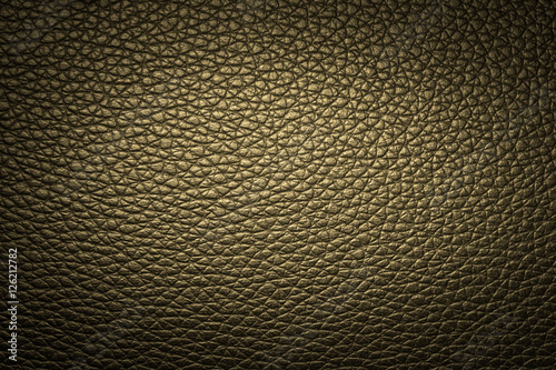 Yellow leather texture or leather background from natural leather sheet for design with copy space for text or image. Closeup detail on leather texture background. Dark edged.